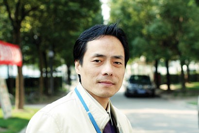 记全国劳模、中科院研究员王逸平